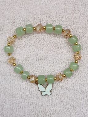 NWOT.Mint Bead Bracelet with Butterfly Charm